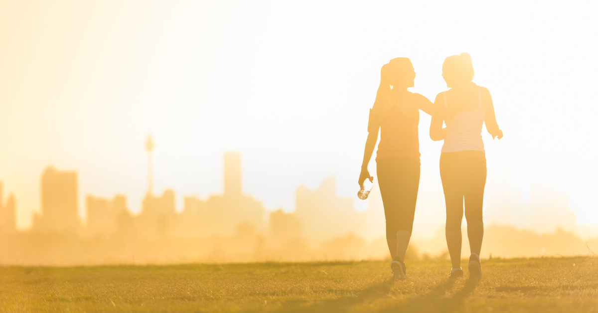 two women on a walk and talk therapy session